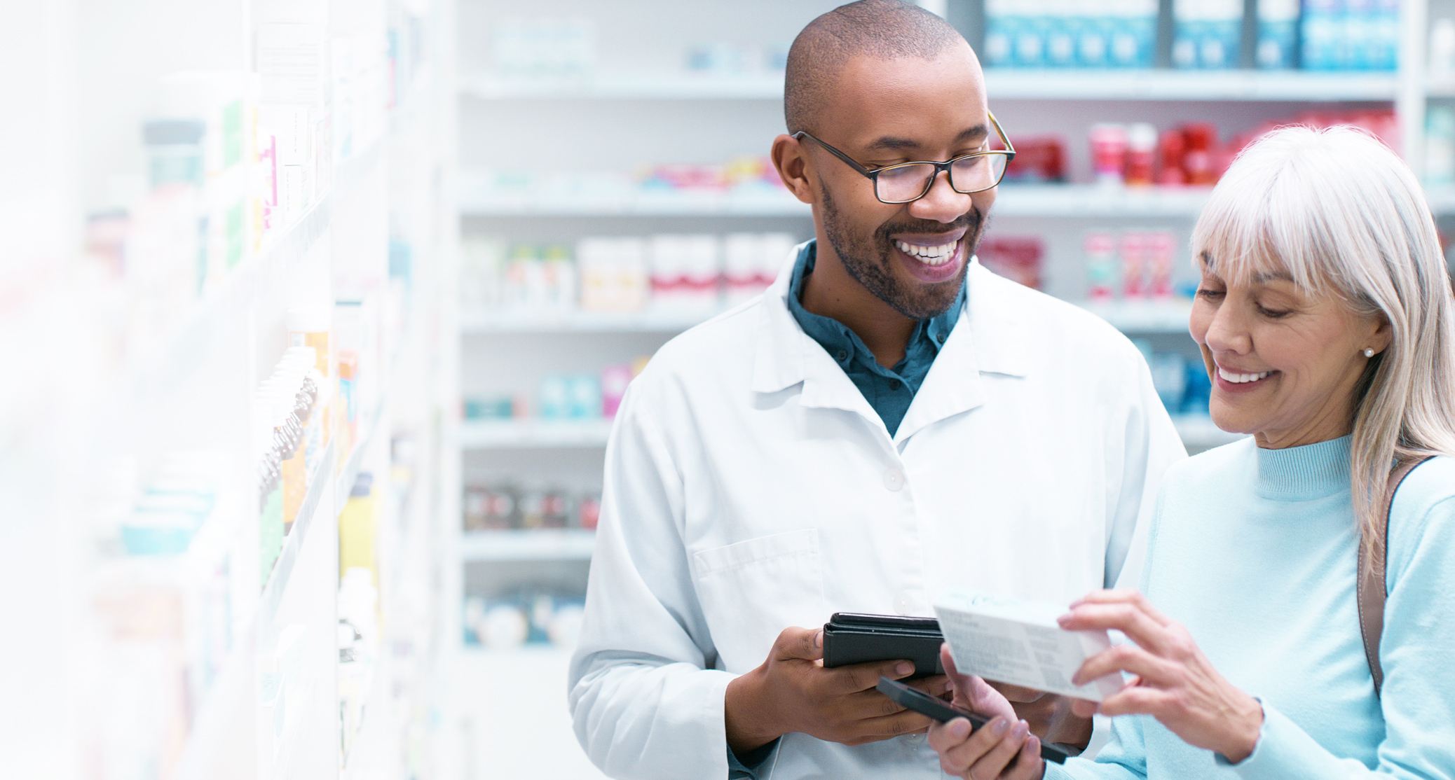 Pharmacist helping customer 